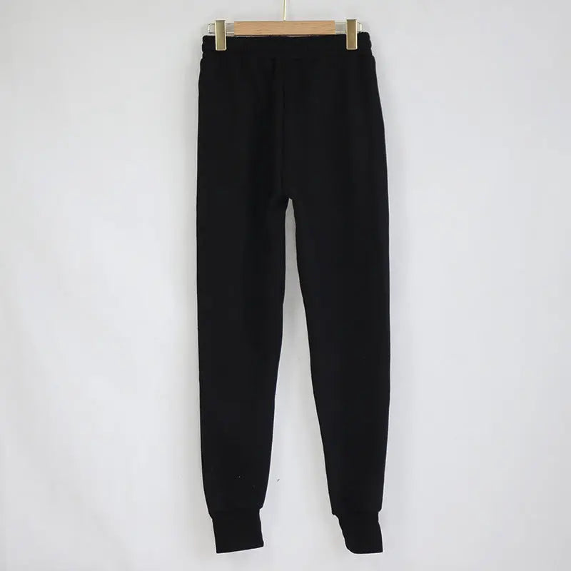 All-match ins wind net red solid color strap slim trousers Lady T Fashions