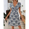 Women's Vibrant Leopard Print Twist Front V Neck Casual Summer Short Sleeve Bodycon Mini Dresses Lady T Fashions