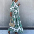 Women's Bohemian Flowy Maxi Dress - Charming V-Neck With Bell Sleeves, Bold Printed Pattern, Side Slit Design Lady T Fashions