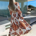 Women's Bohemian Flowy Maxi Dress - Charming V-Neck With Bell Sleeves, Bold Printed Pattern, Side Slit Design Lady T Fashions