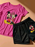 A Two-Piece Outfit Featuring a Printed Short-Sleeve T-Shirt with Dropped Shoulders And Cropped Leggings, Designed for Plus-Size Women, Licensed with Mickey And Minnie. Lady T Fashions